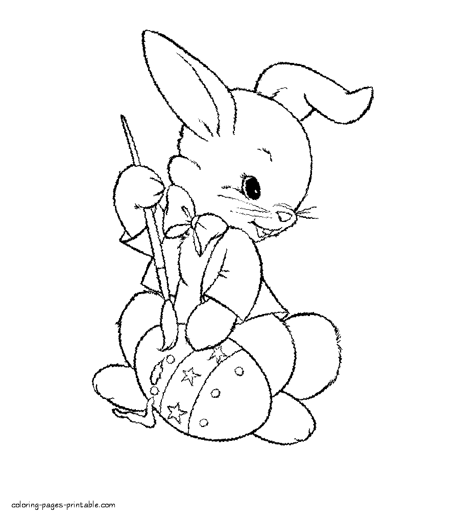 Easter coloring page bunny draws on the egg