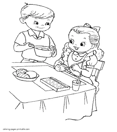 Children coloring eggs to Easter