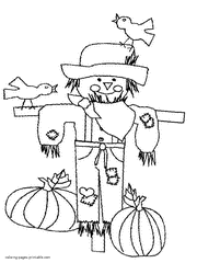 Free holidays colouring pages. Thanksgiving scarecrow picture