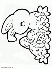 Easter bunny and colored eggs. Spring celebrates coloring pages